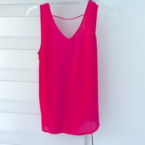 Naked Zebra, Small, bright hot pink top, open back.